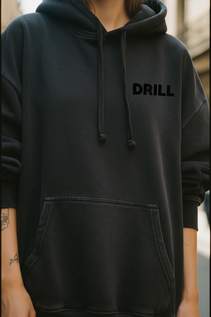 DRILL logo chest detail close-up